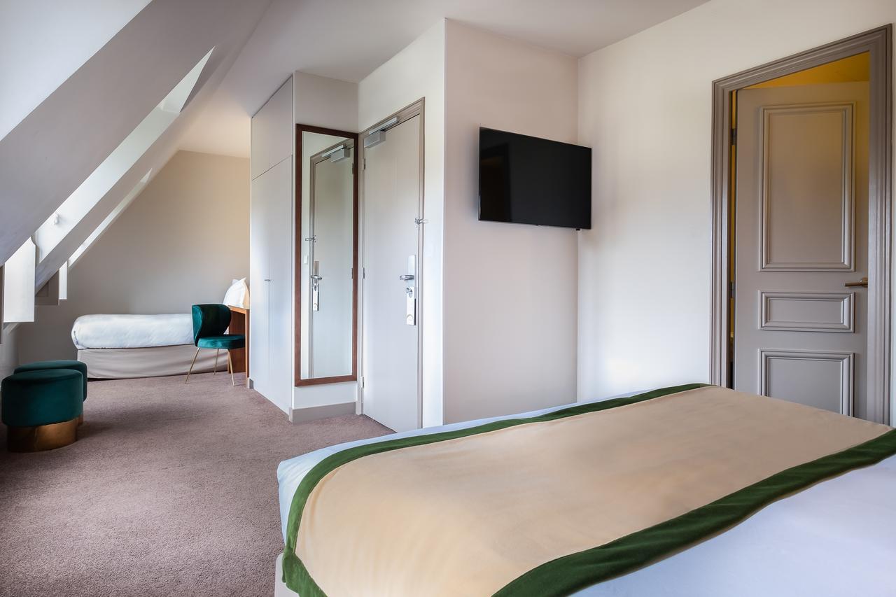 Hotel Le Tourville By Inwood Hotels Paris Exterior photo
